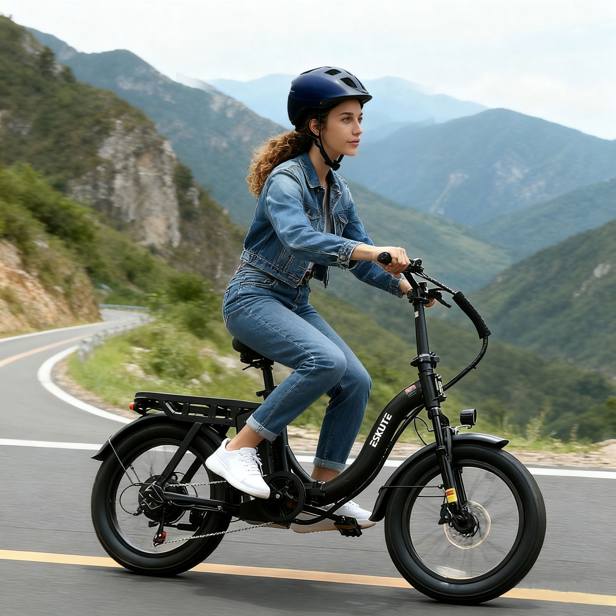 Woman riding an electric bike on a mountain road